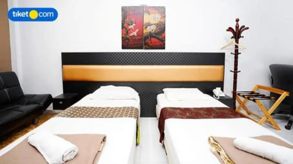 Bed in Lai Ming Hotel Cosmoland