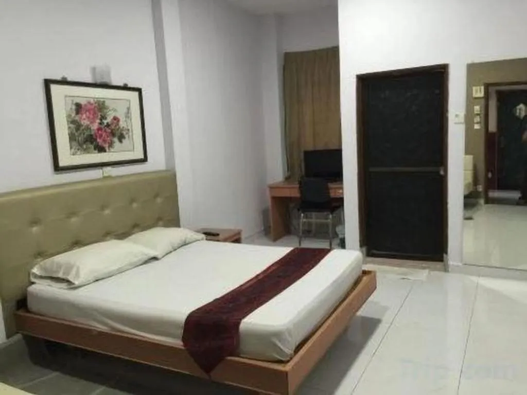 Bed in Lai Ming Hotel Cosmoland