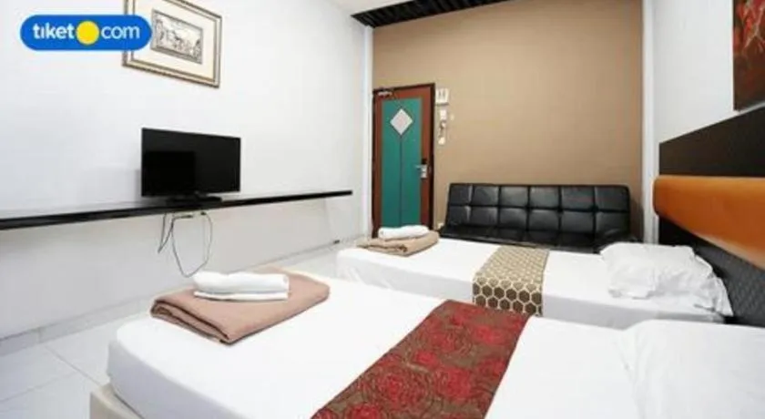 Bed in Lai Ming Hotel Cosmoland