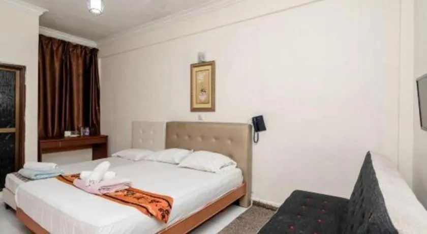 Bed in Lai Ming Hotel Cosmoland