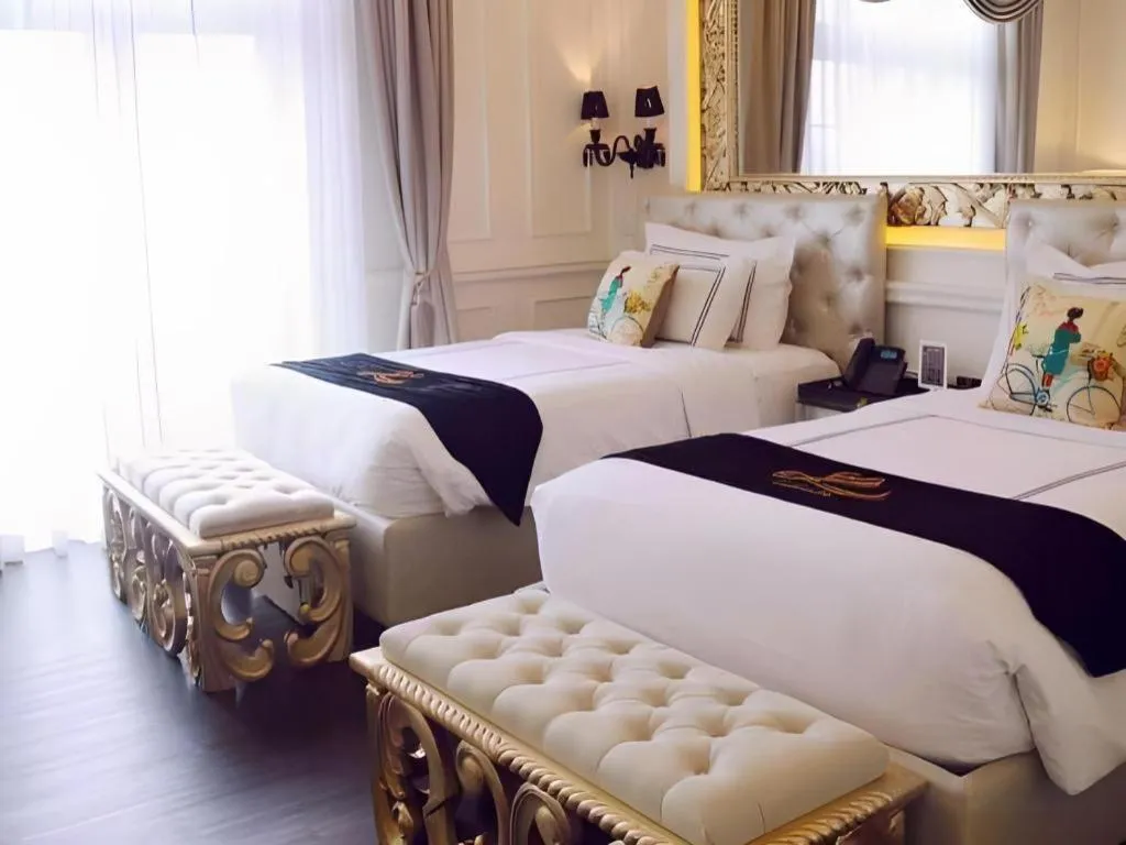 Bed in Lafayette Boutique Hotel