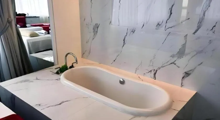 Bed in Lafayette Boutique Hotel