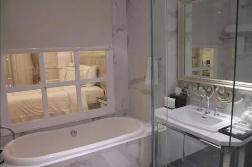 Bed in Lafayette Boutique Hotel