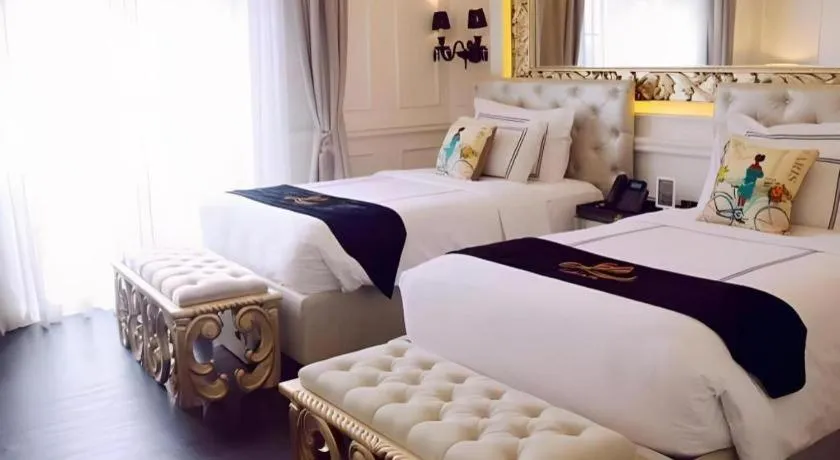 Bed in Lafayette Boutique Hotel