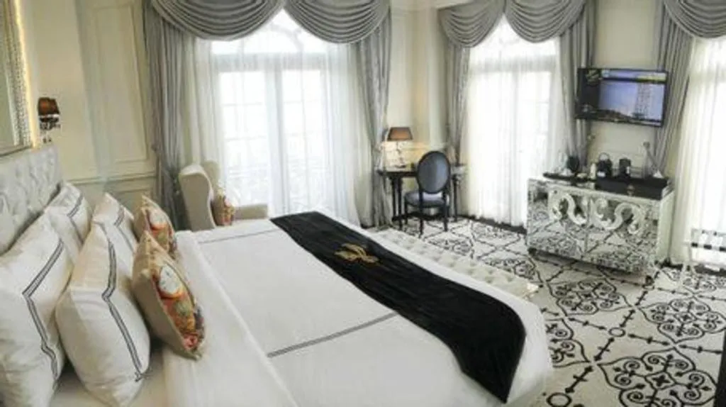 Bed in Lafayette Boutique Hotel