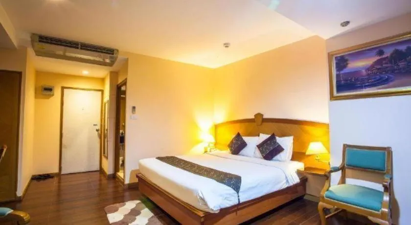 Bed in NH Elegant Hotel