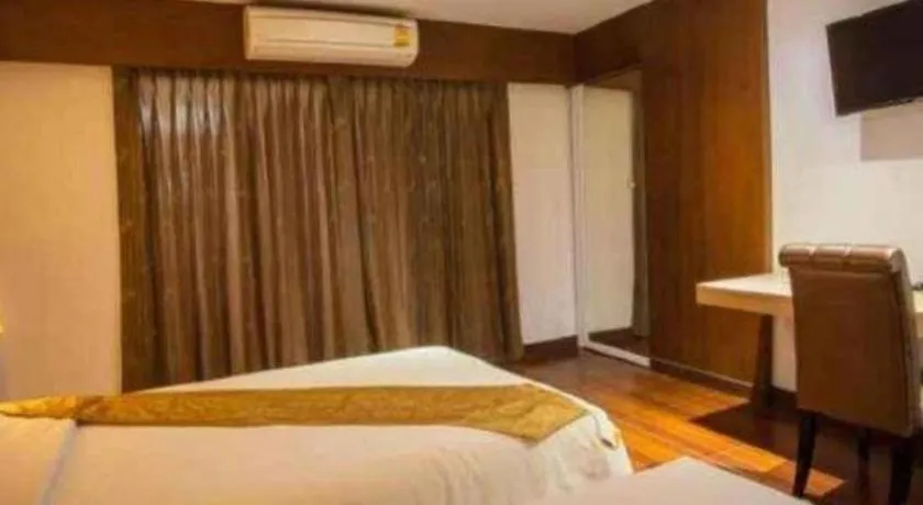 Bed in NH Elegant Hotel