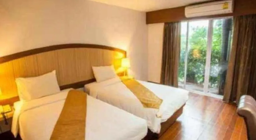 Bed in NH Elegant Hotel