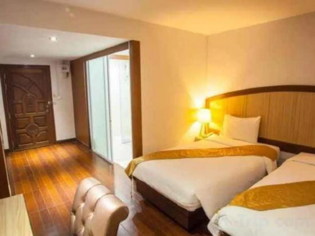 Bed in NH Elegant Hotel