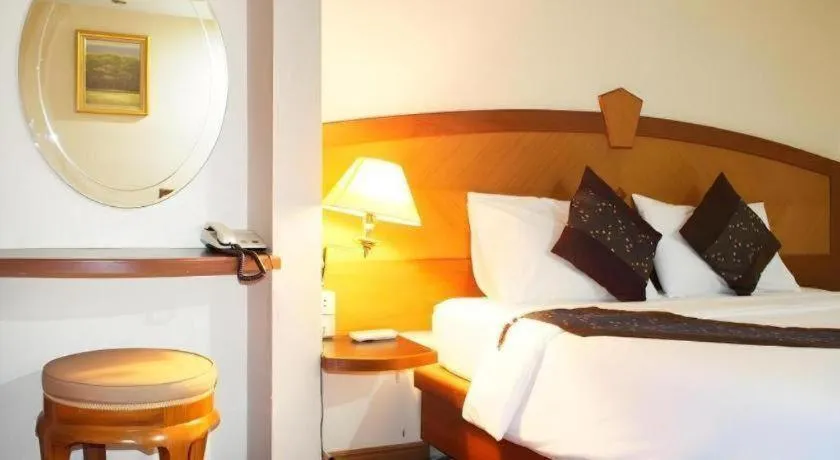 Bed in NH Elegant Hotel