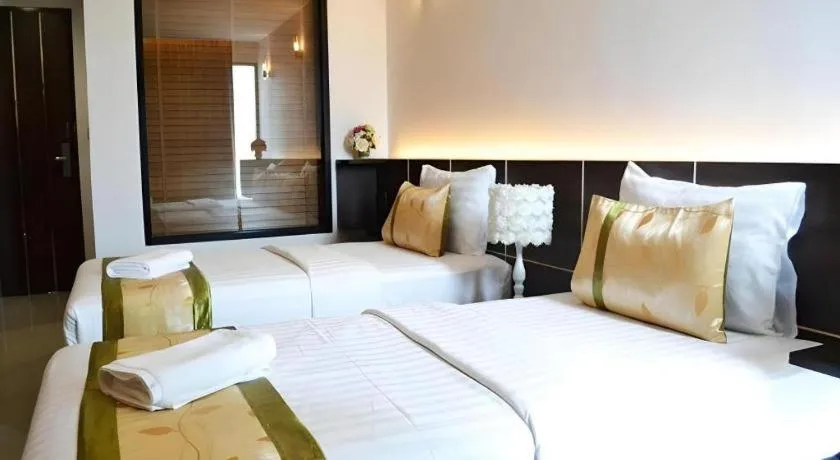 Bed in The Convenience Hotel