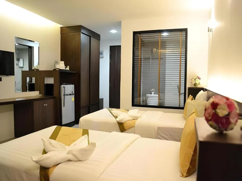 Bed in The Convenience Hotel