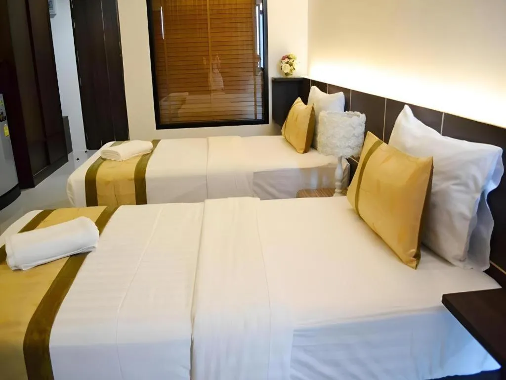 Bed in The Convenience Hotel