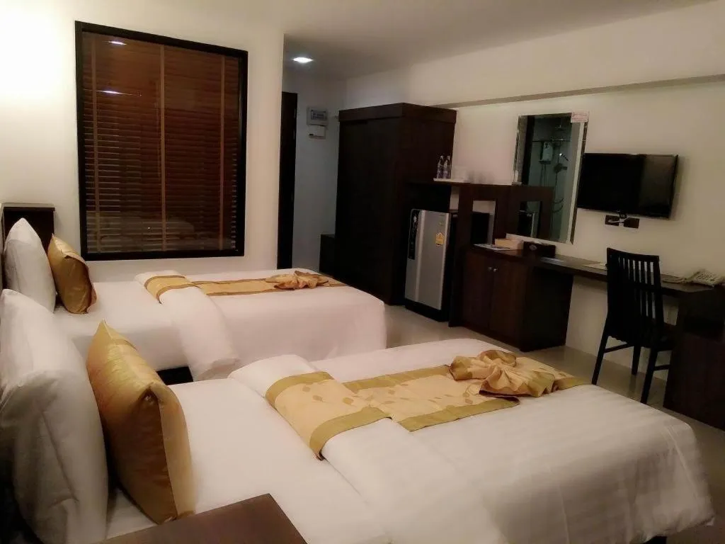 Bed in The Convenience Hotel