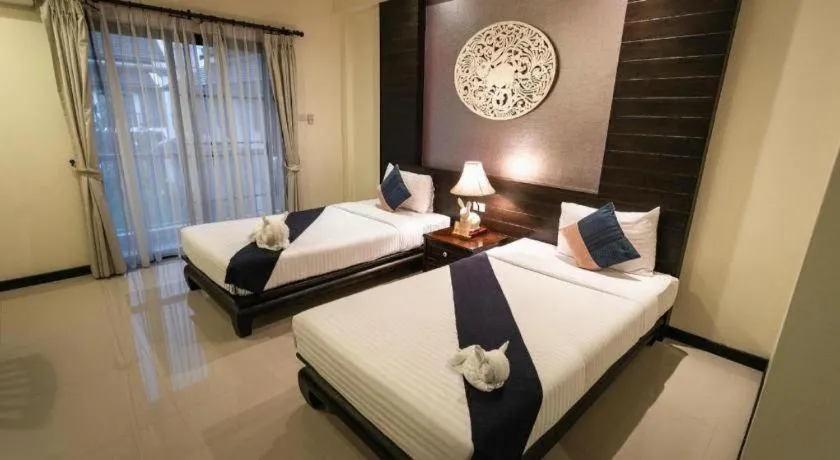 Bed in Wiangkaew Hotel