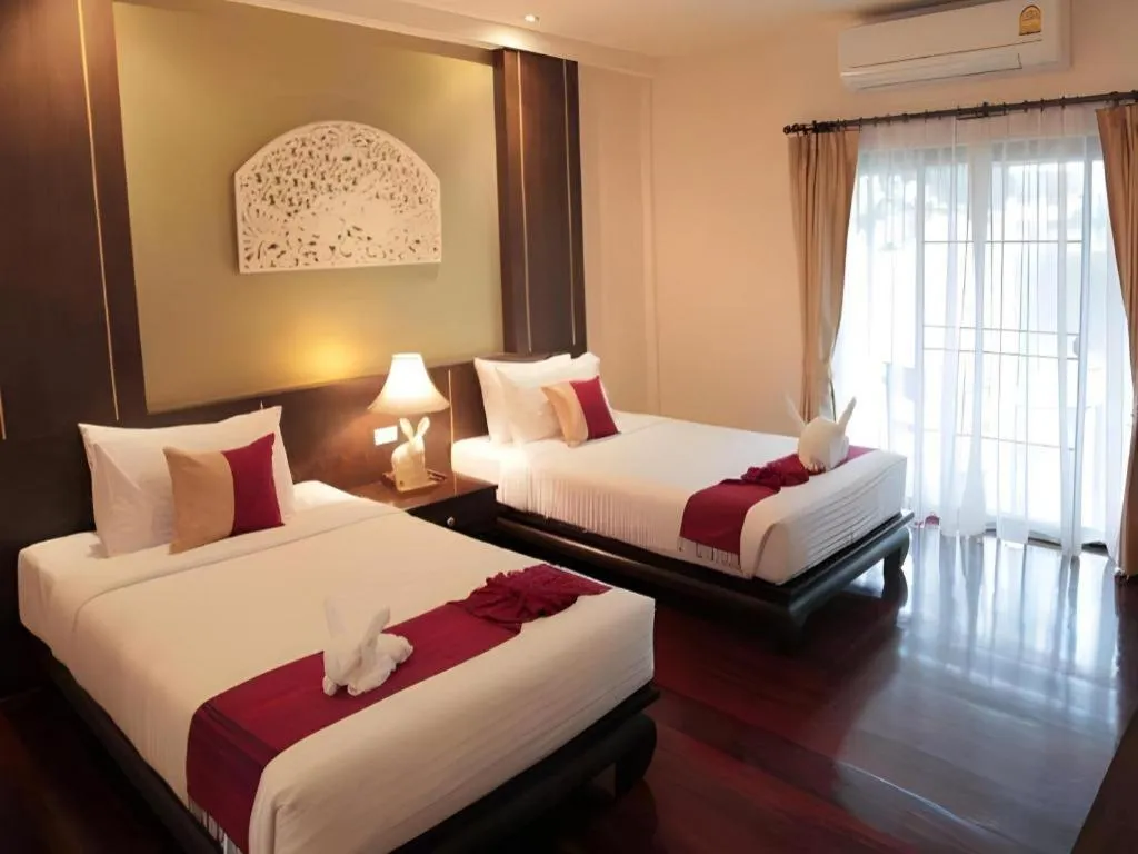 Bed in Wiangkaew Hotel