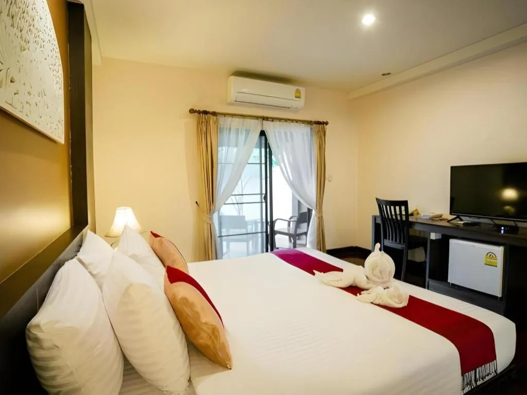 Bed in Wiangkaew Hotel