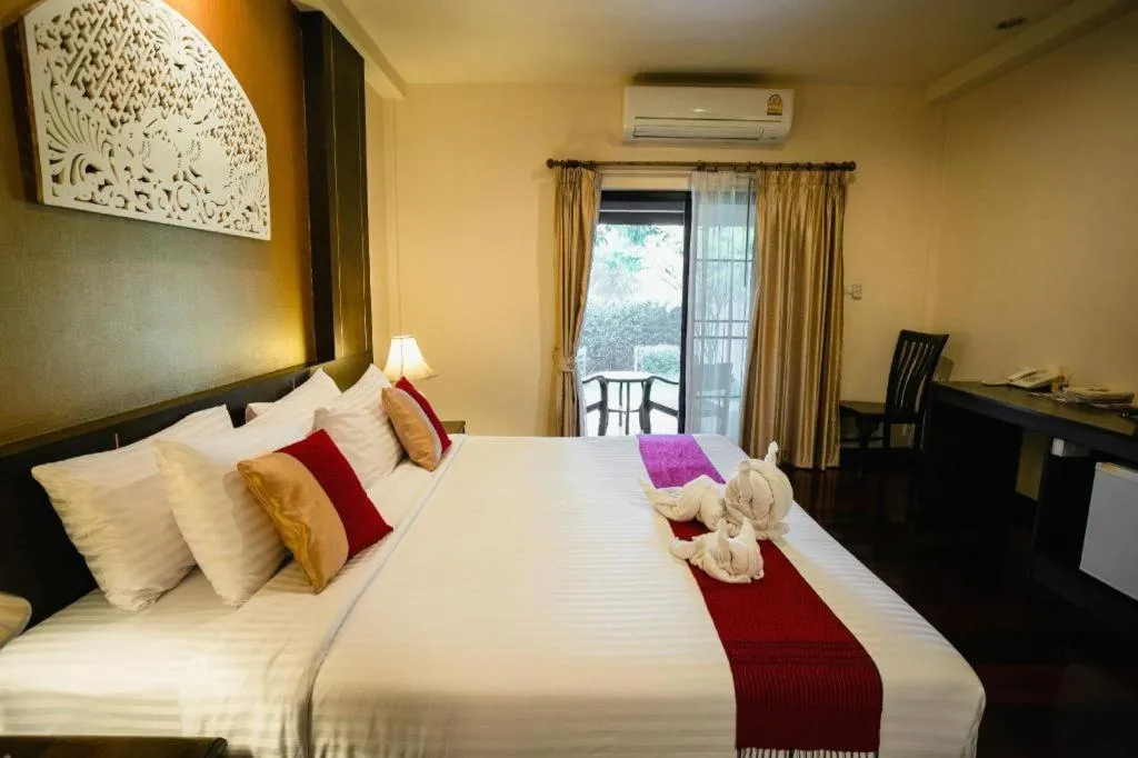 Bed in Wiangkaew Hotel