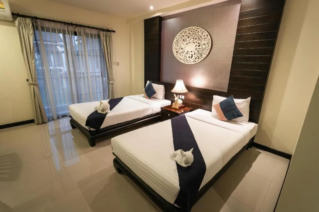 Bed in Wiangkaew Hotel