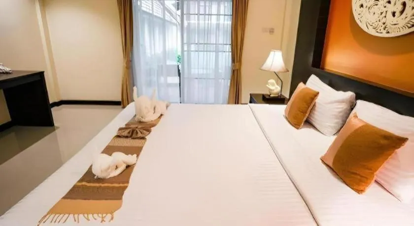 Bed in Wiangkaew Hotel