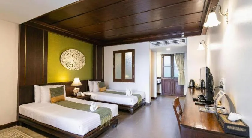 Bed in Wiangkaew Hotel