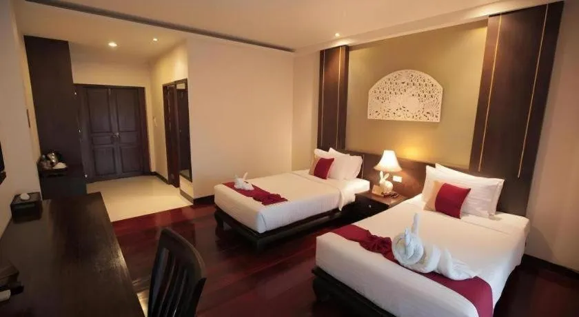 Bed in Wiangkaew Hotel