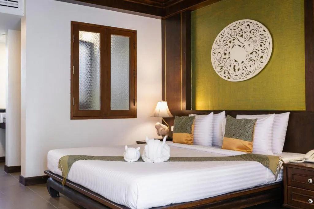 Bed in Wiangkaew Hotel