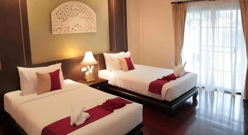 Bed in Wiangkaew Hotel