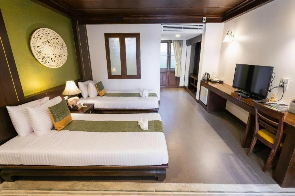 Bed in Wiangkaew Hotel