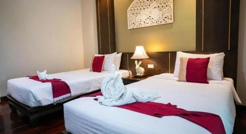 Bed in Wiangkaew Hotel