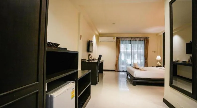 Bed in Wiangkaew Hotel