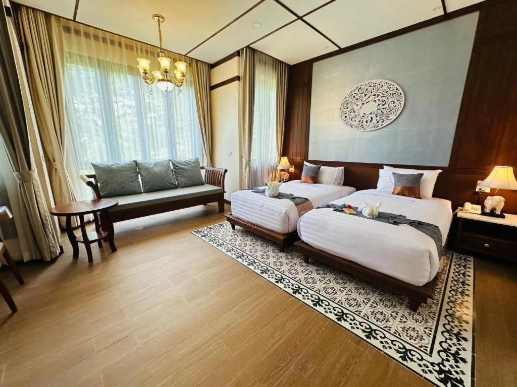 Bed in Wiangkaew Hotel