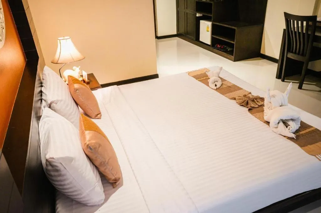 Bed in Wiangkaew Hotel