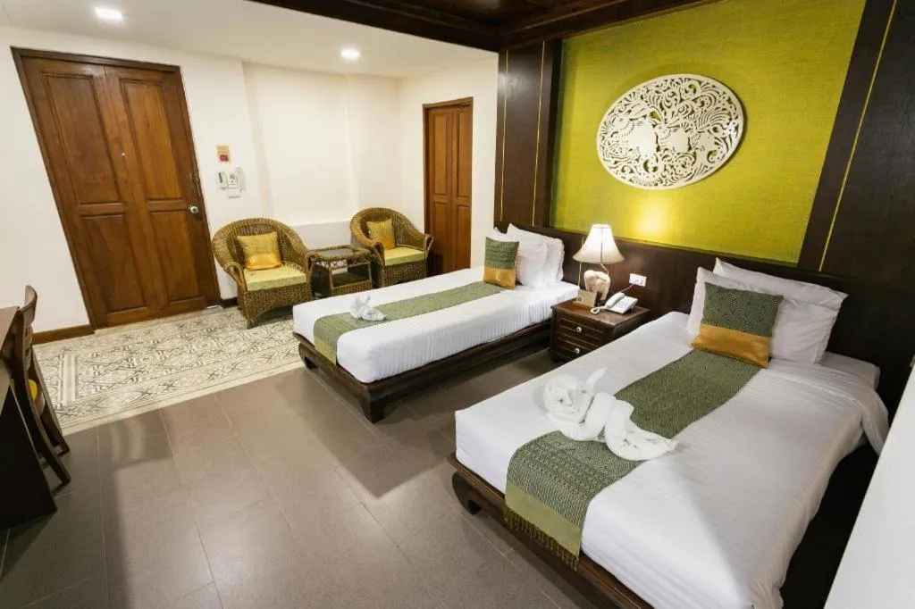 Bed in Wiangkaew Hotel