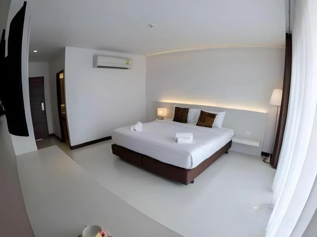 Bed in Chaisaeng Villa