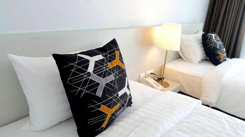 Bed in Chaisaeng Villa