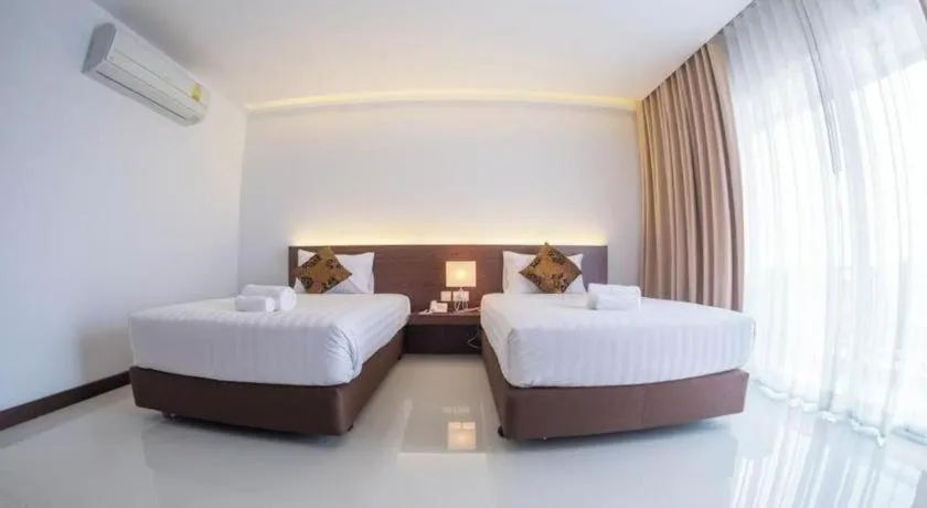 Bed in Chaisaeng Villa