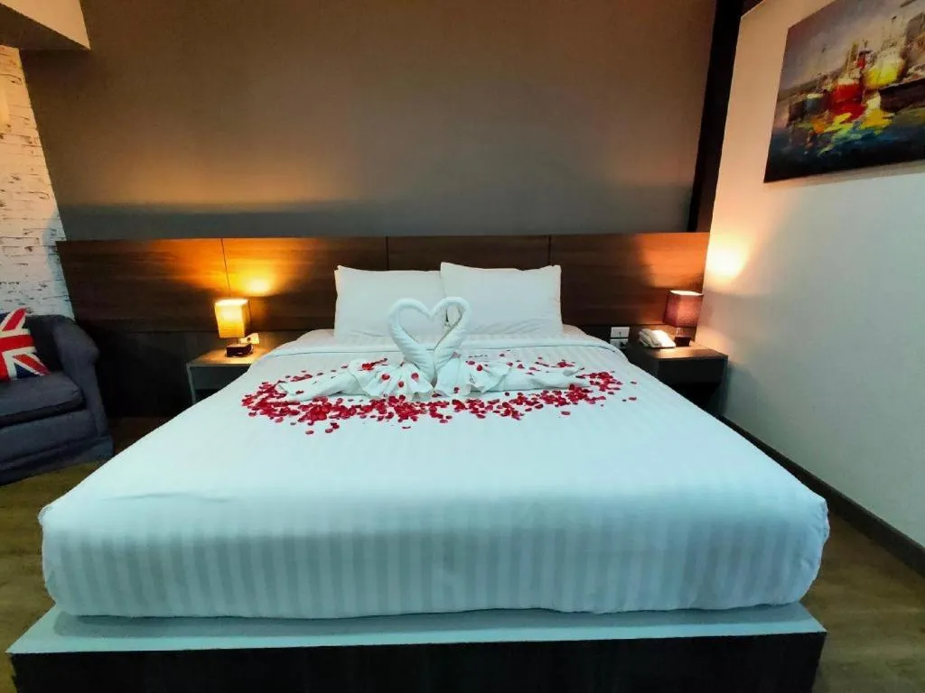 Bed in The Loft Seaside Sriracha Hotel