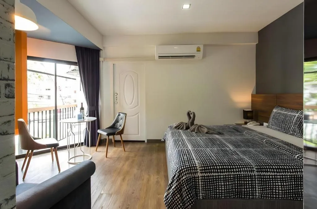 Bed in The Loft Seaside Sriracha Hotel