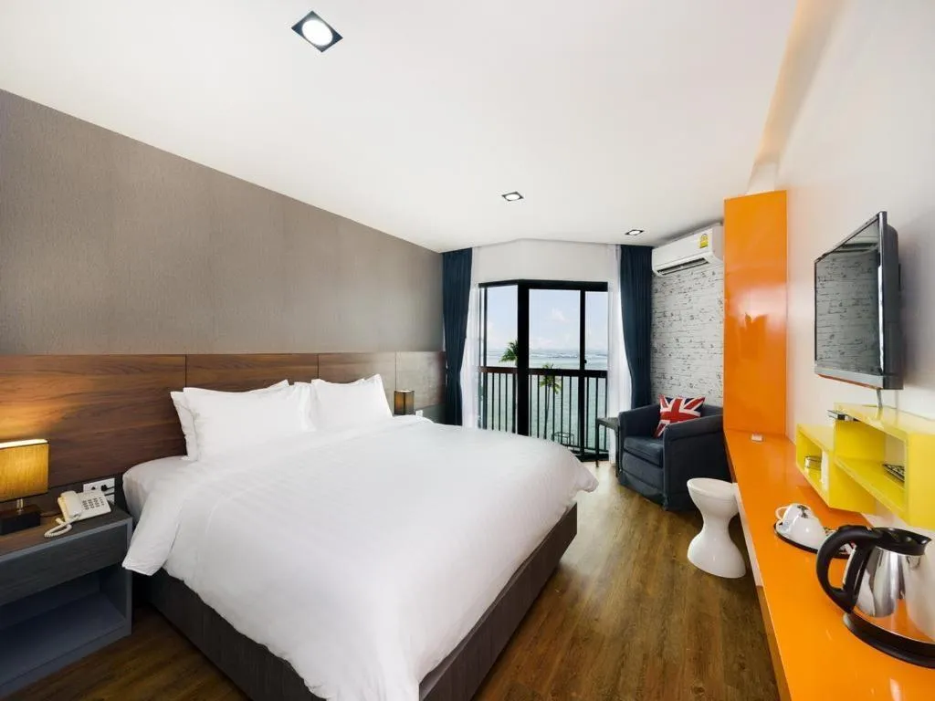 Bed in The Loft Seaside Sriracha Hotel