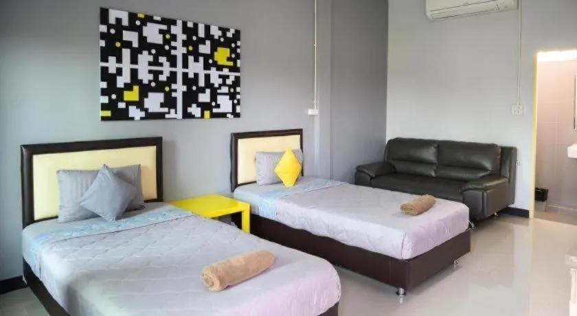 Bed in Nithra Ratree Hotel