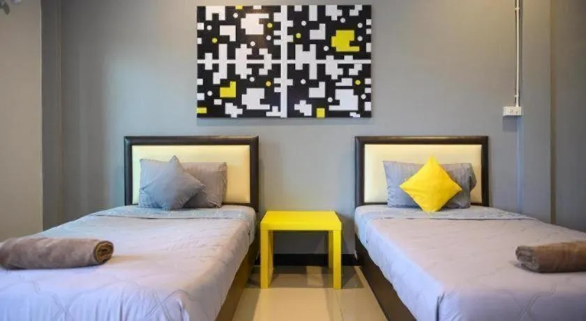 Bed in Nithra Ratree Hotel