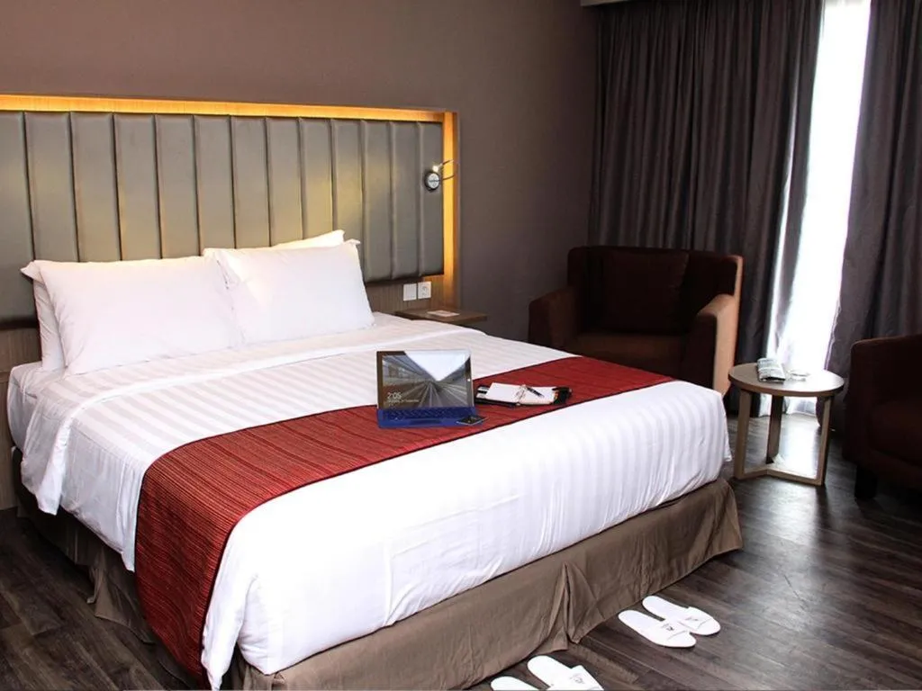 Bed in Gammara Hotel Makassar