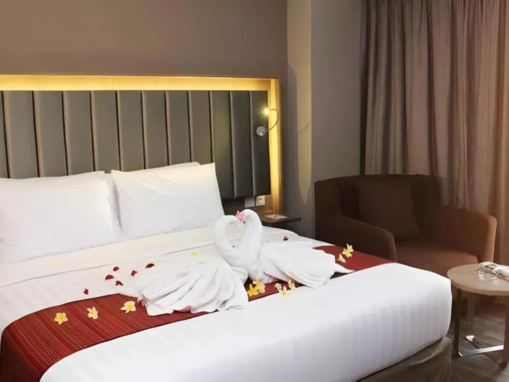 Bed in Gammara Hotel Makassar