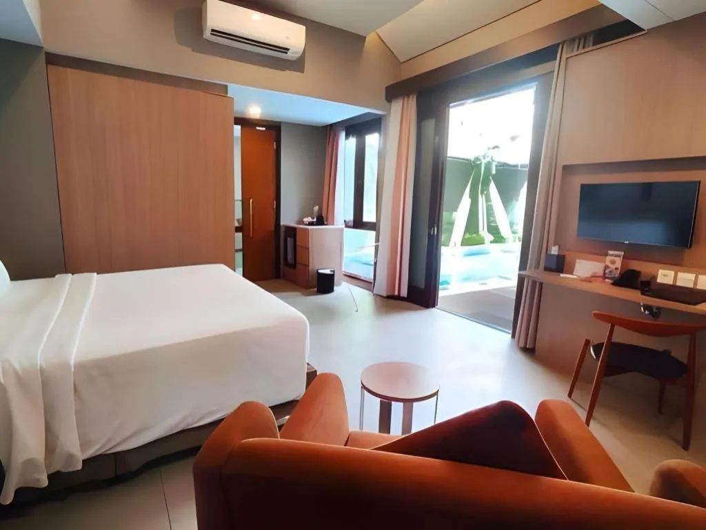 Bed in Gammara Hotel Makassar