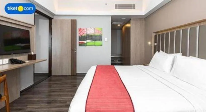 Bed in Gammara Hotel Makassar