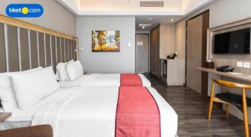 Bed in Gammara Hotel Makassar