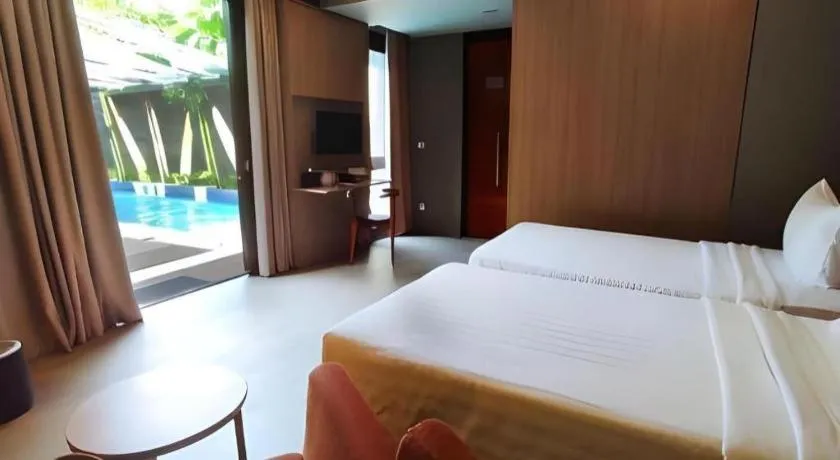 Bed in Gammara Hotel Makassar