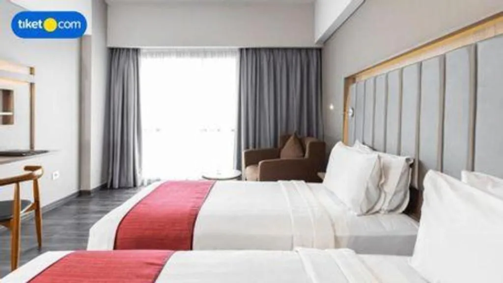 Bed in Gammara Hotel Makassar