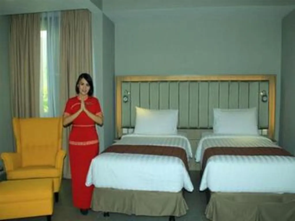 Bed in Gammara Hotel Makassar